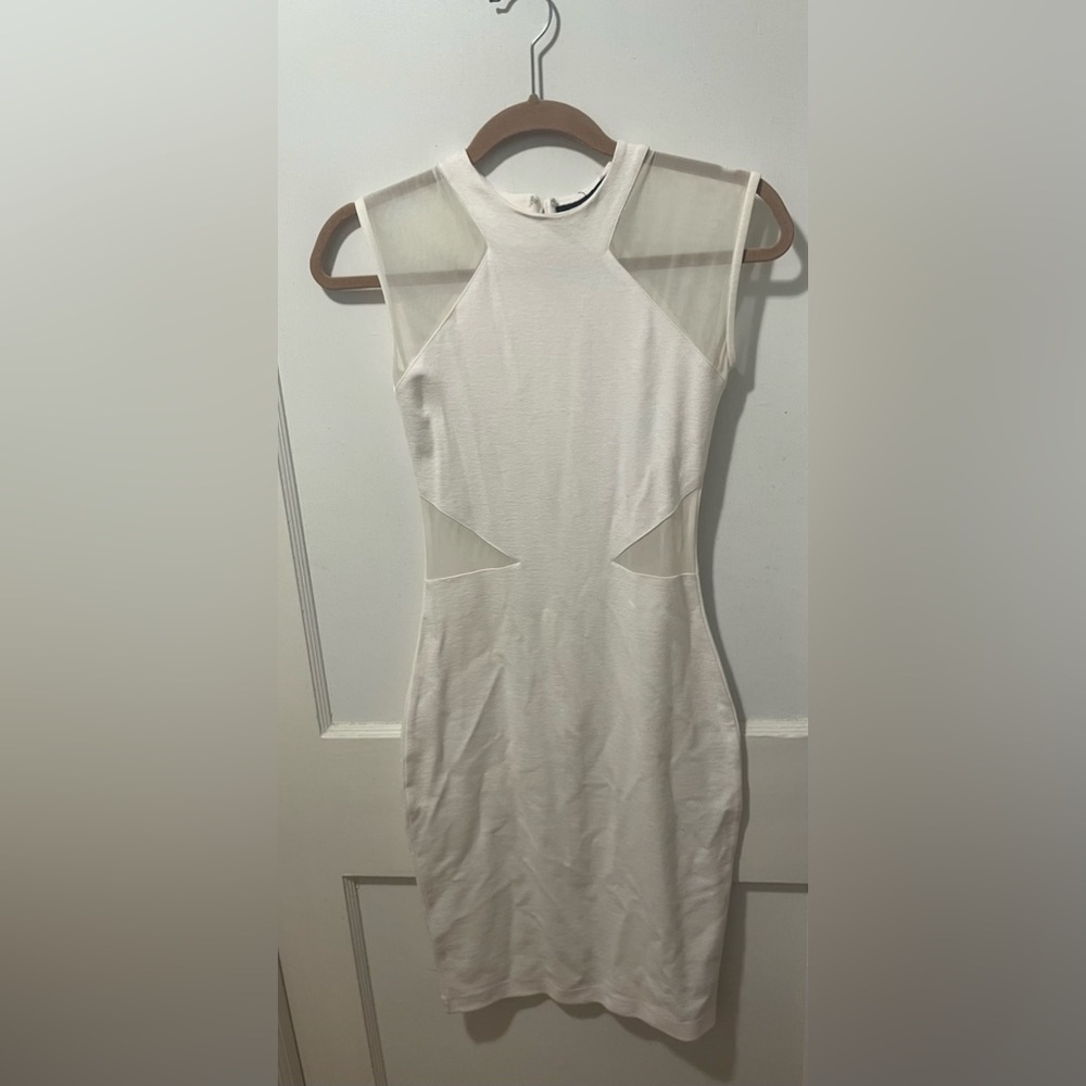 Very sharp, white with sheer inset
